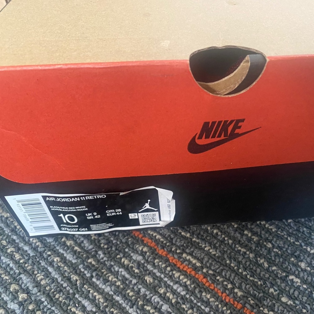 Jordan retro 11 black and red